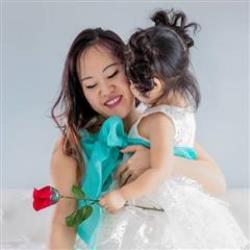 Angela Wan Newborn Photographer - profile picture